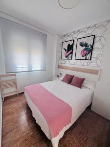 Postel nebo postele na pokoji v ubytování PENSION NAVAS