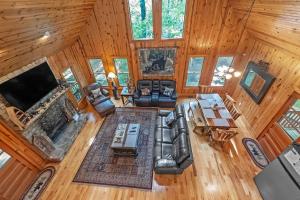 an overhead view of a living room in a cabin at Mountain Getaway with Hot Tub & Game Room cabin in Cleveland