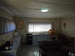 Kuchyň nebo kuchyňský kout v ubytování Feather Rest