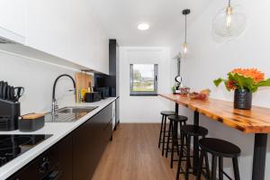 Η κουζίνα ή μικρή κουζίνα στο GuestReady - JB Comfort Flat