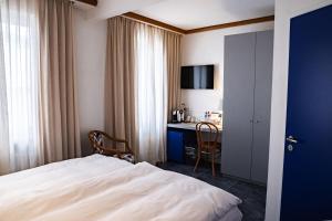Postelja oz. postelje v sobi nastanitve Albergo Carcani by Ketty & Tommy