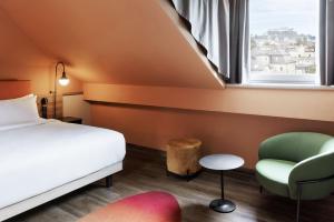 Łóżko lub łóżka w pokoju w obiekcie Mayburg Salzburg, a Tribute Portfolio Hotel