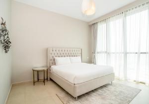 Postel nebo postele na pokoji v ubytování HomesGetaway - Sophisticated 3BR with Maids Room in Downtown