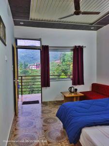 Postel nebo postele na pokoji v ubytování Shiv Shankar Resort