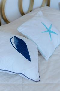 Postel nebo postele na pokoji v ubytování Villino dei Coralli