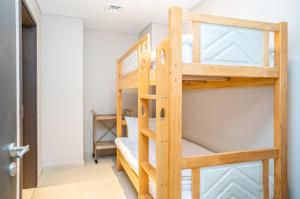 Palanda nebo palandy na pokoji v ubytování HomesGetaway - Sophisticated 3BR with Maids Room in Downtown