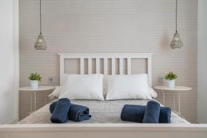 Ένα ή περισσότερα κρεβάτια σε δωμάτιο στο Apartamento Princesa Teguise +12 φωτογραφίες