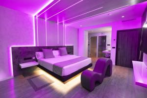 Postel nebo postele na pokoji v ubytování Motel JOC + 1 fotografie