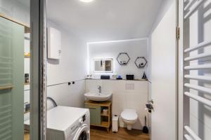 Ένα μπάνιο στο Ferienwohnung Nordhelle +22 φωτογραφίες