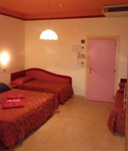 Postel nebo postele na pokoji v ubytování Hotel Imperiale & SPA