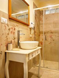 a bathroom with a sink and a shower at B&B Dei Bottai in Gallipoli +17 photos