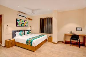 Treebo Address Inn Gachibowli客房内的一张或多张床位