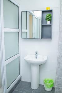 Koupelna v ubytování Appartements meublés mpita