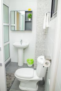 Koupelna v ubytování Appartements meublés mpita