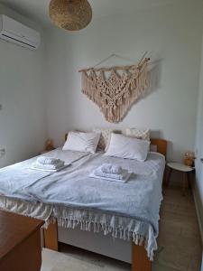 Postel nebo postele na pokoji v ubytování Elysian Garden