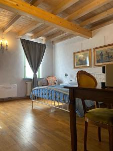 Fotografia z galérie ubytovania La Casina v destinácii Dello