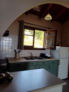 Kuchyň nebo kuchyňský kout v ubytování Eleana apartments and studios