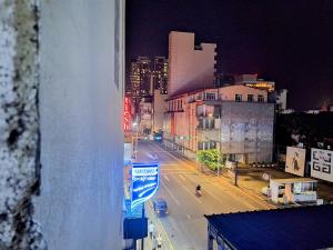 a view of a city street at night at Backpack Lanka in Colombo