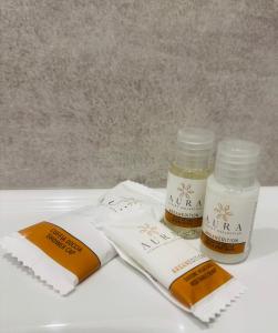 two bottles of essential oils sitting on a table at Conte Cavour B&B in Peschici +66 photos