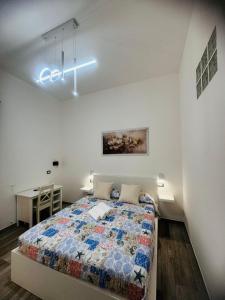 Postel nebo postele na pokoji v ubytování Conte Cavour B&B
