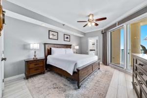 Voodi või voodid majutusasutuse Beach Colony Tower Unit 18C toas