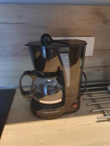 a blender sitting on top of a wooden table at Barbara 12 in Ustroń