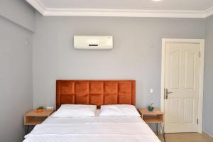 Postel nebo postele na pokoji v ubytování villa almond