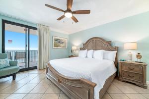 a bedroom with a bed and a ceiling fan at Phoenix X Unit 803 in Orange Beach