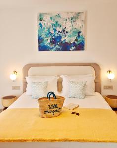 Postel nebo postele na pokoji v ubytování VILLA MARGARIT Boutique Hotel