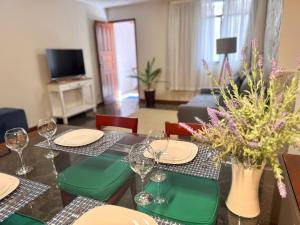 TV a/nebo společenská místnost v ubytování Apartamento térreo no coração da cidade