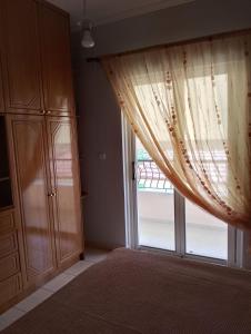 Postel nebo postele na pokoji v ubytování Spiros House