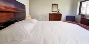 Postel nebo postele na pokoji v ubytování Amorosa Beach Apartment Family