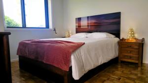 Postel nebo postele na pokoji v ubytování Amorosa Beach Apartment Family