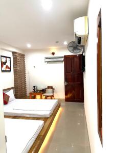 Kuchyň nebo kuchyňský kout v ubytování Nguyen Ha Hotel