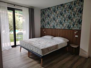 Postel nebo postele na pokoji v ubytování B&B El Rocol