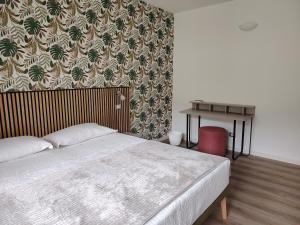 Postel nebo postele na pokoji v ubytování B&B El Rocol