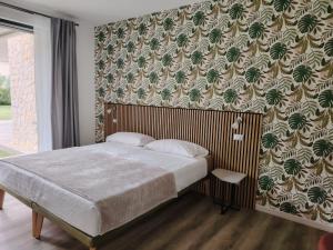 Postel nebo postele na pokoji v ubytování B&B El Rocol