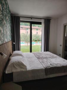 Postel nebo postele na pokoji v ubytování B&B El Rocol