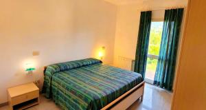Postel nebo postele na pokoji v ubytování Residence Alithai + 37 fotografií