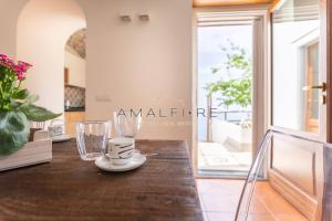Фотография из галереи Lionetti Suite House в Амальфи