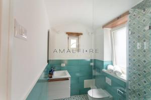 Ванная комната в Lionetti Suite House +17 фотографий