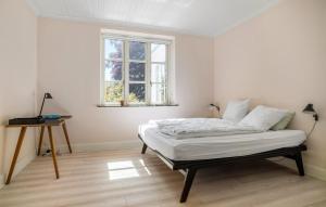 Letto o letti in una camera di Awesome Home In Haslev With Kitchen
