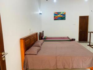 Postel nebo postele na pokoji v ubytování KNR Resort