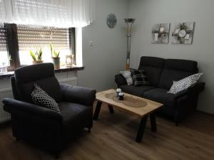 Posezení v ubytování Eifelferienwohnungen "Familie Saxler"
