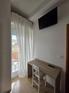 TV a/nebo společenská místnost v ubytování Villa Ella by Interlux
