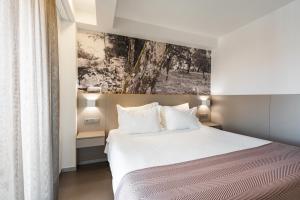 Postel nebo postele na pokoji v ubytování Serra d'Aire Boutique Hotel - SA Hotels
