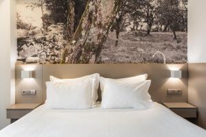 Postel nebo postele na pokoji v ubytování Serra d'Aire Boutique Hotel - SA Hotels