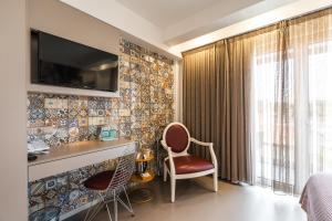 TV a/nebo společenská místnost v ubytování Serra d'Aire Boutique Hotel - SA Hotels