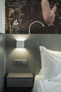 Postel nebo postele na pokoji v ubytování Serra d'Aire Boutique Hotel - SA Hotels