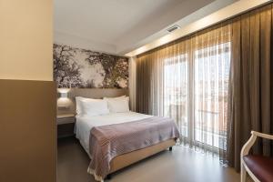 Postel nebo postele na pokoji v ubytování Serra d'Aire Boutique Hotel - SA Hotels